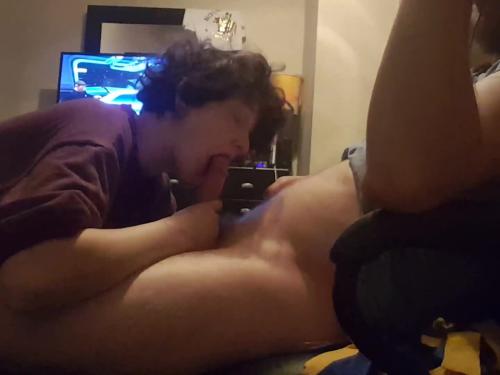 Big hard cock sucked while playing video game